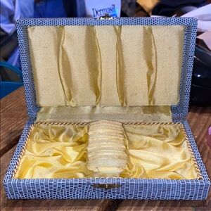 vintage Textured Gray Box with yellow interior some kind of riser